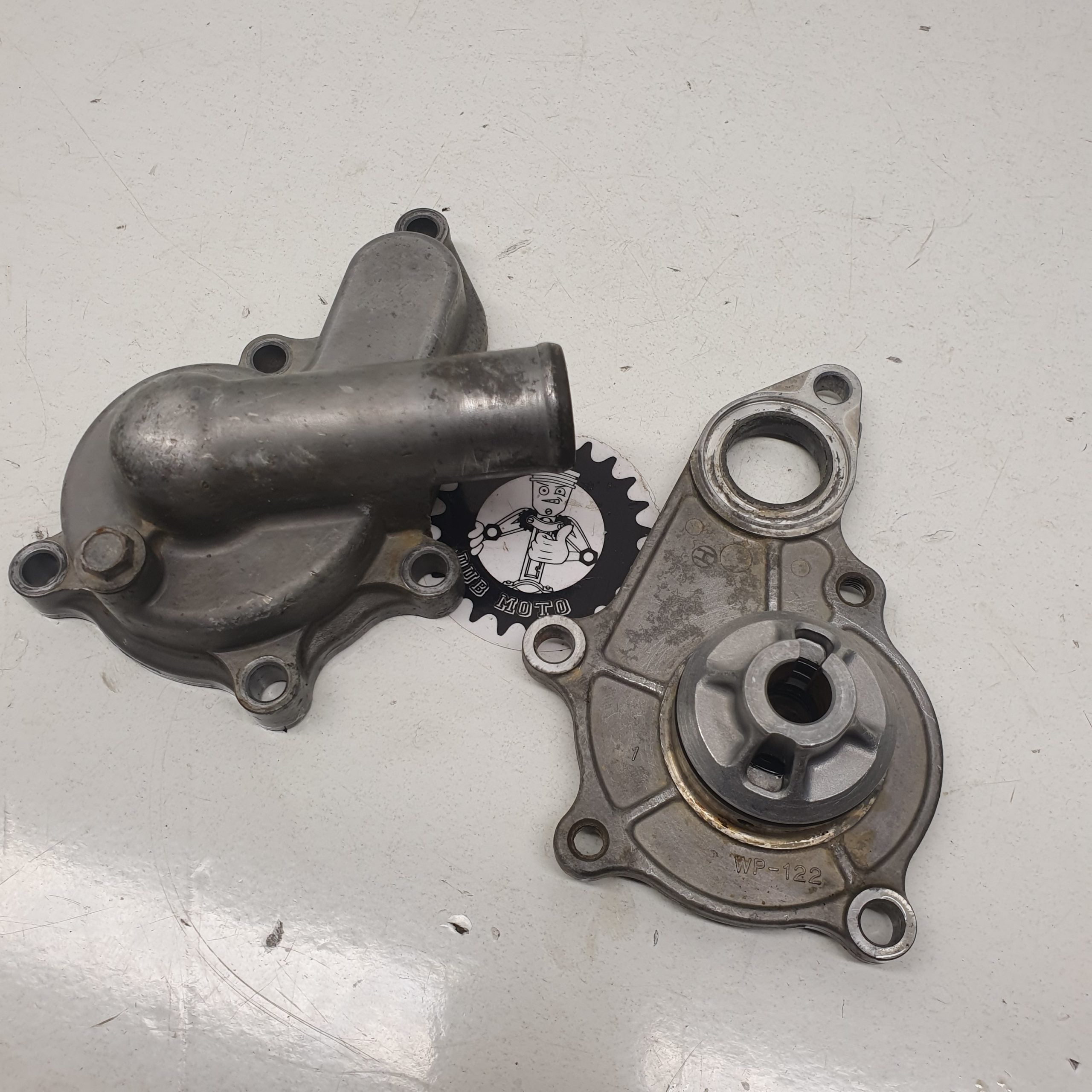 carter pompe a eau suzuki 450 ltr