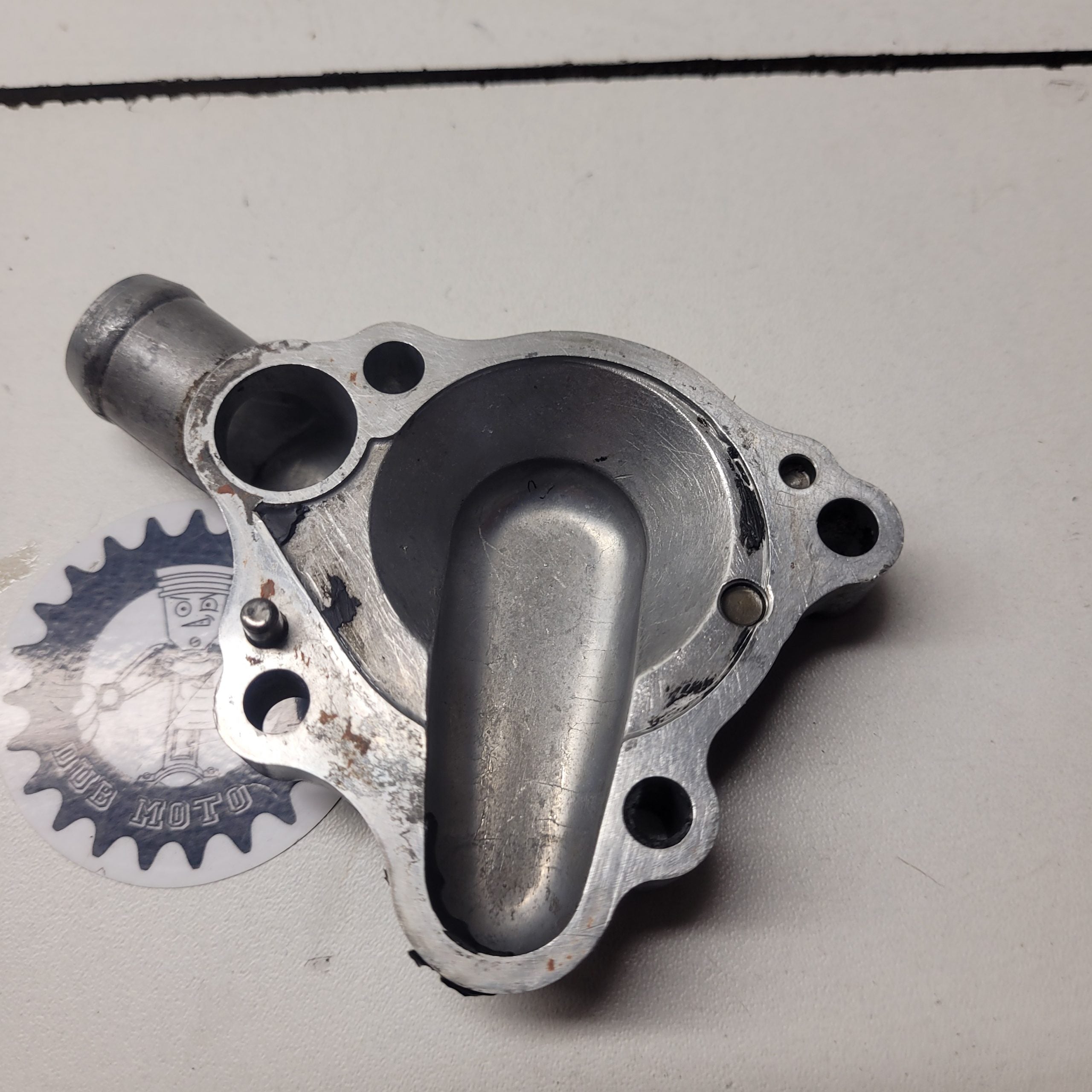 carter pompe a eau honda 125 cr 2000