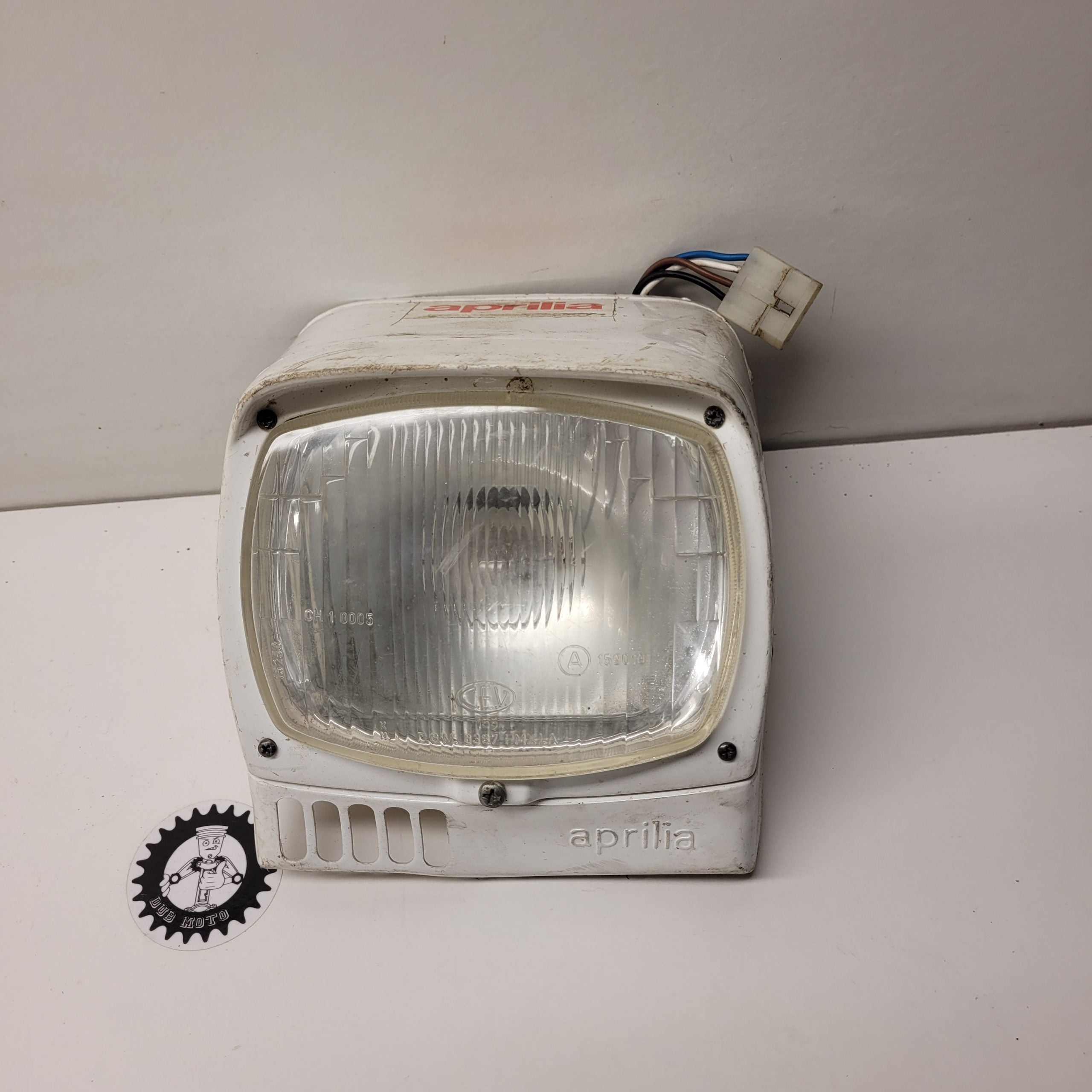 plaque phare aprilia 240 txr