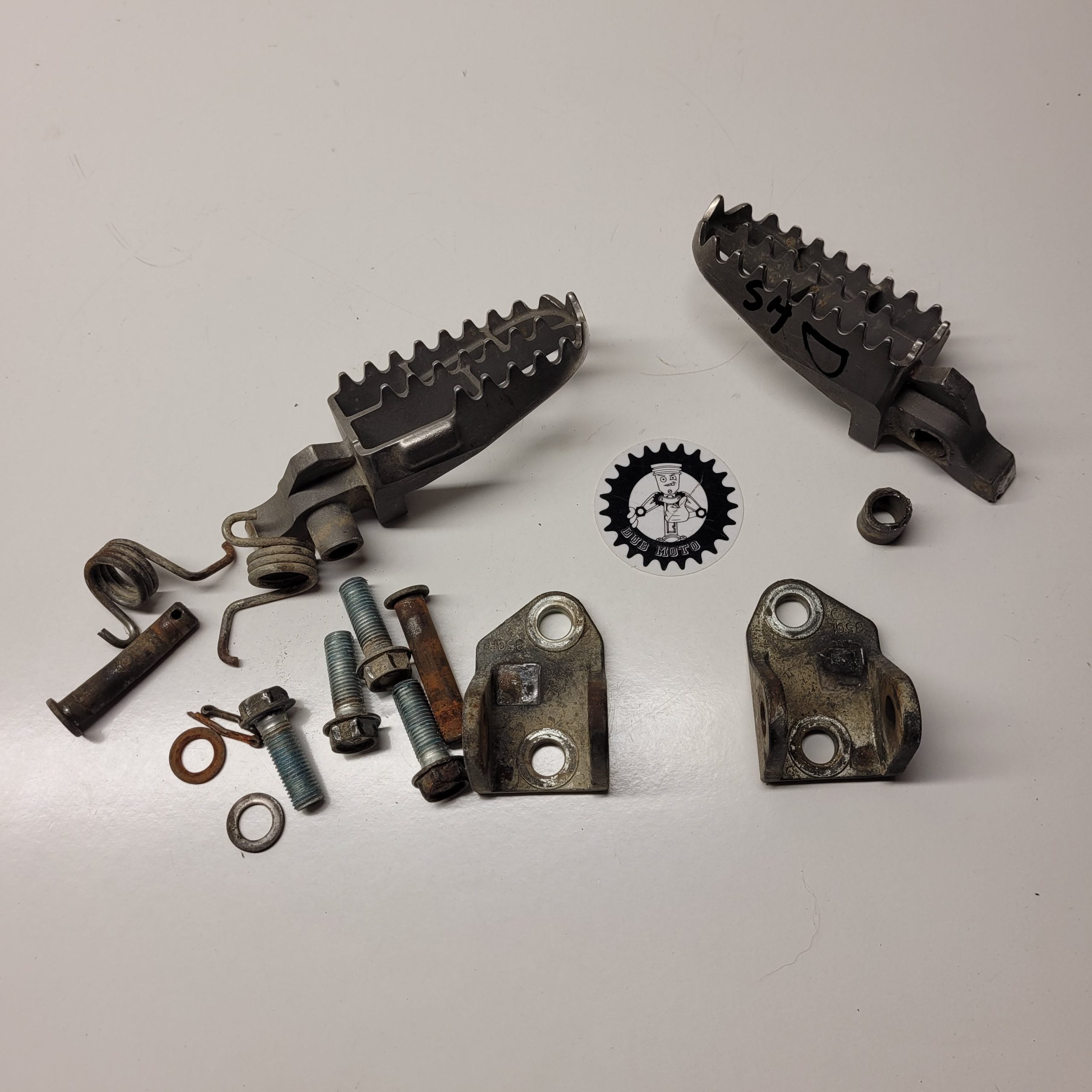 cale pied gauche suzuki 450 rmz 2006