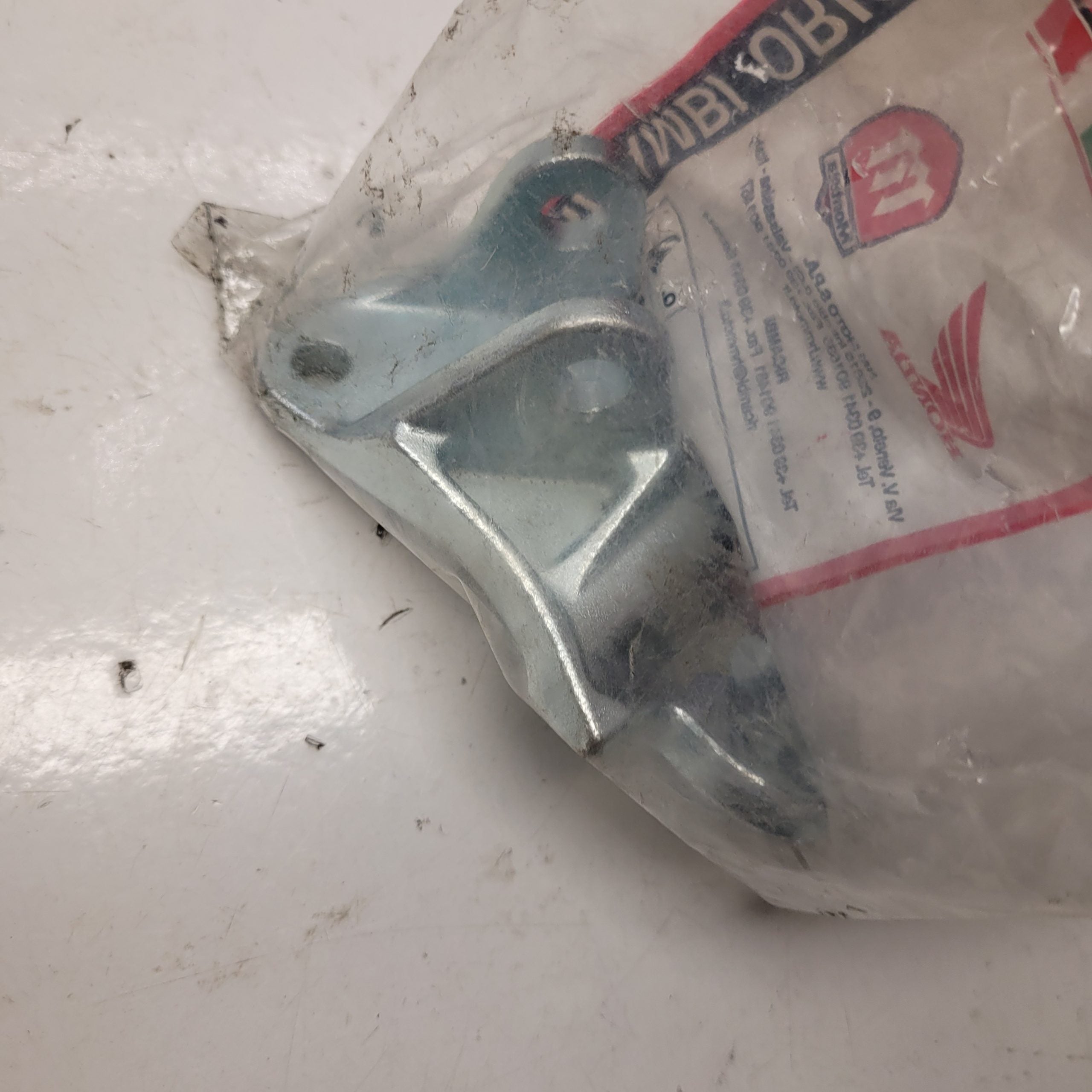 support cale pied gauche honda 50 hm KA3406510